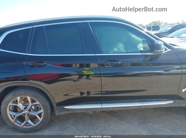 5UXTY5C03L9D45975 2020 BMW X3 Black Widok wnętrza z tyłu