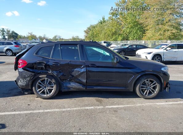 5UXTY5C08L9B49045 2020 BMW X3 Black Rear interior view