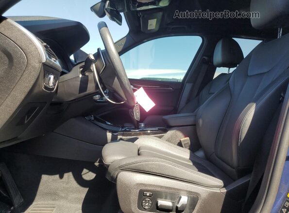 5UXTY5C08L9C30434 2020 BMW X3 Blue Front interior view