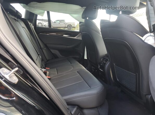 5UXTY5C09L9B76979 2020 BMW X3 Black Widok wnętrza z tyłu