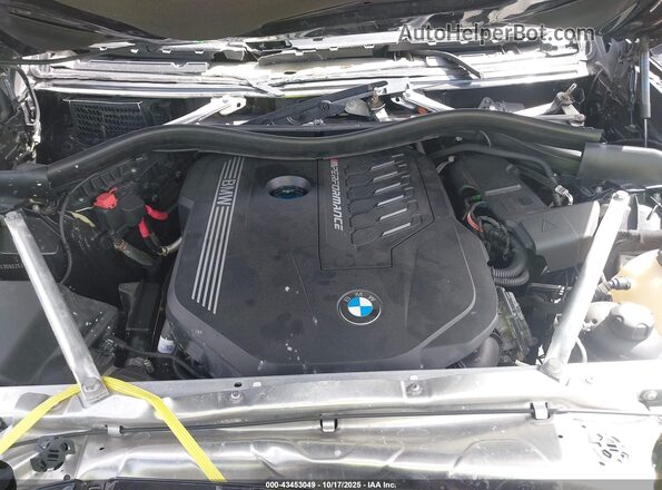 5UXTY9C00L9D65253 2020 BMW X3 Black Rear view