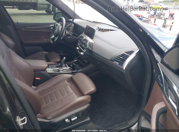 5UXTY9C00L9D65253 2020 BMW X3 Black Front interior view