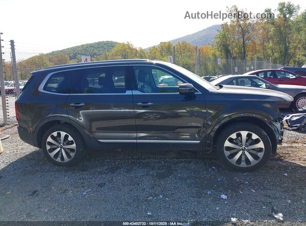 5XYP64HCXLG095622 2020 KIA TELLURIDE Зеленый Вид задней части салона