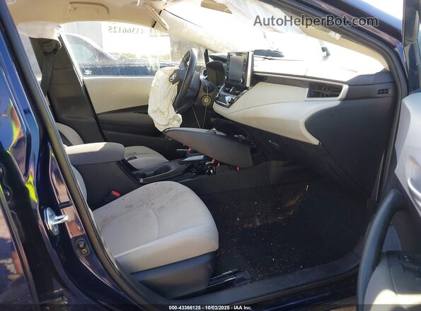 5YFEPMAE1MP267209 2021 TOYOTA LL Navy წინა სალონის ხედი