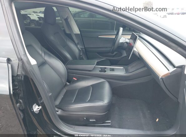 5YJ3E1EA4NF376652 2022 TESLA MODEL 3 Black Front interior view