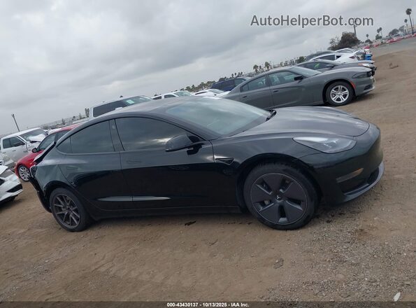 5YJ3E1EA4NF376652 2022 TESLA MODEL 3 Black Rear interior view