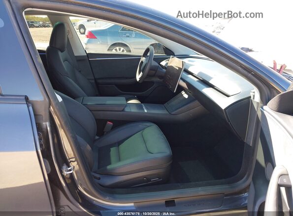 5YJ3E1EB0RF815909 2024 TESLA MODEL 3 Gray Front interior view