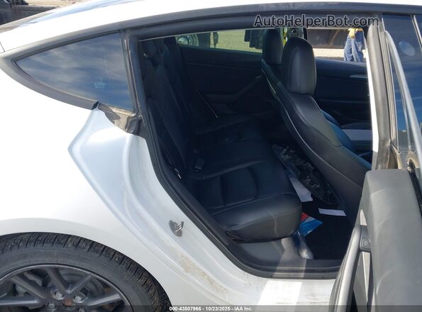 5YJ3E1EB7MF998654 2021 TESLA MODEL 3 White VIN კოდის სტიკერის ხედი