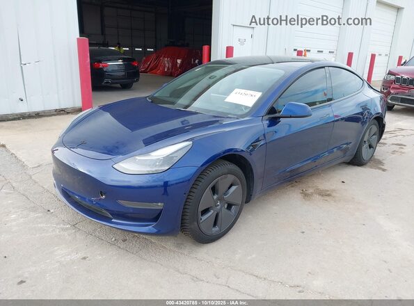 5YJ3E1EBXNF106771 2022 TESLA MODEL 3 Blue Առջևի ձախ երեք քառորդ տեսարան