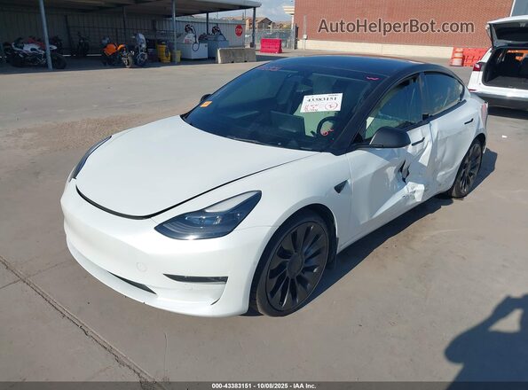 5YJ3E1EC8NF124713 2022 TESLA MODEL 3 White Vista tres cuartos delantera izquierda