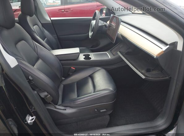 5YJYGAEE8MF218784 2021 TESLA MODEL Y Черный Вид салона спереди