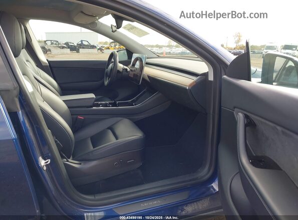 5YJYGDEE5MF065914 2021 TESLA MODEL Y Blue Front interior view
