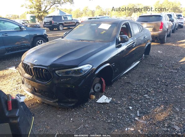 5YMCY0C0XM9G56512 2021 BMW X6 M Black Առջևի ձախ երեք քառորդ տեսարան