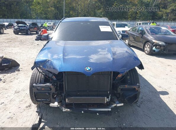 5YMTS0C00LLT10243 2020 BMW X3 Blue Սալոնի հետևի տեսք