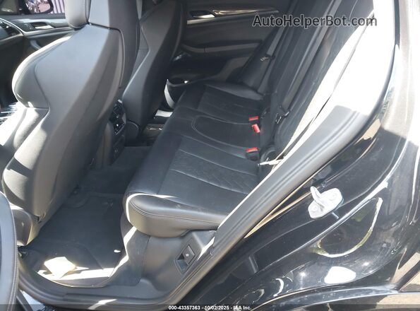 5YMUJ0C03LLA99730 2020 BMW X4 Black VIN კოდის სტიკერის ხედი