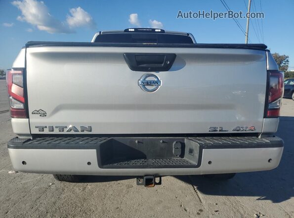 1N6AA1EDXLN501808 2020 NISSAN TITAN Silver Widok wnętrza z przodu