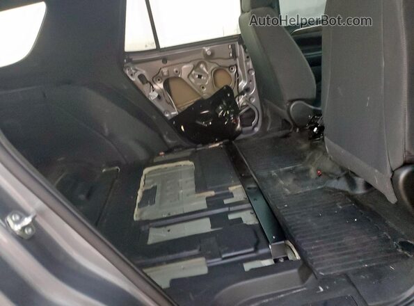 1GNSCLED2NR309945 2022 CHEVROLET TAHOE Gray Vista interior trasera