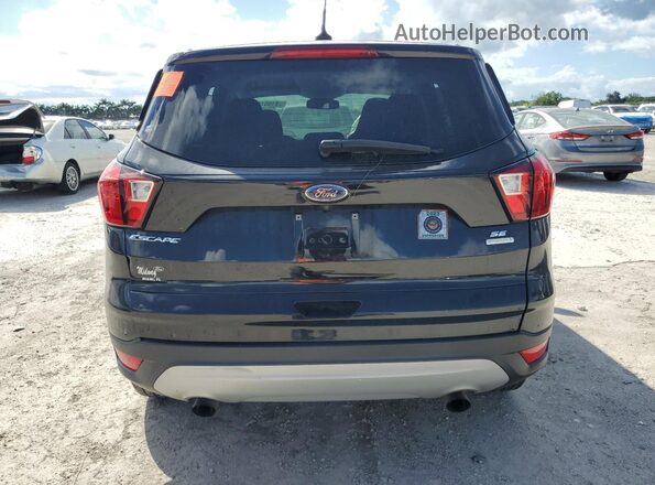 1FMCU0GD1KUA89711 2019 FORD ESCAPE Black Front interior view