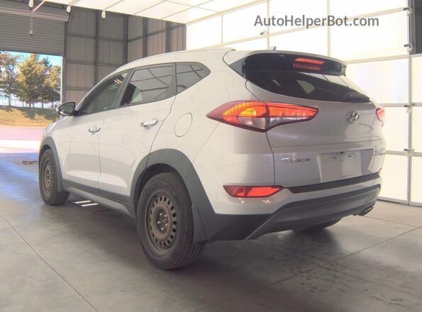 KM8J3CA24GU238767 2016 HYUNDAI TUCSON Silver 