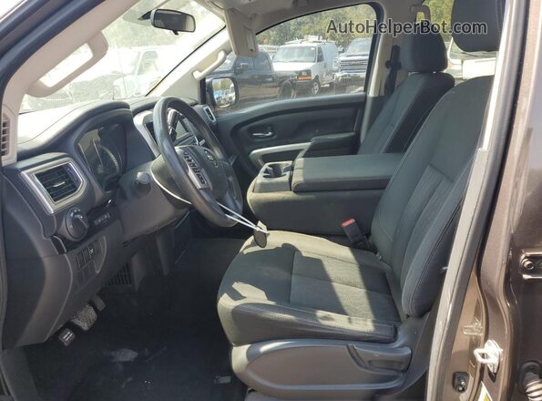 1N6AA1EKXKN523949 2019 NISSAN TITAN Brown Вид панелі приладів