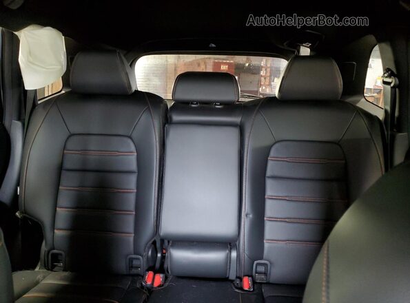 7FARS6H94PE008481 2023 HONDA CR-V Silver Rear seats view