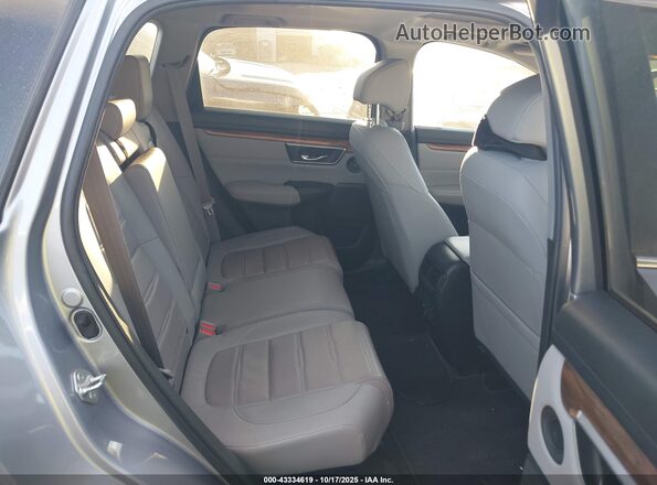 7FARW1H80NE002558 2022 HONDA CR-V Silver Widok naklejki z numerem VIN