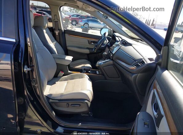 7FARW1H94LE009941 2020 HONDA CR-V Черный Вид салона спереди
