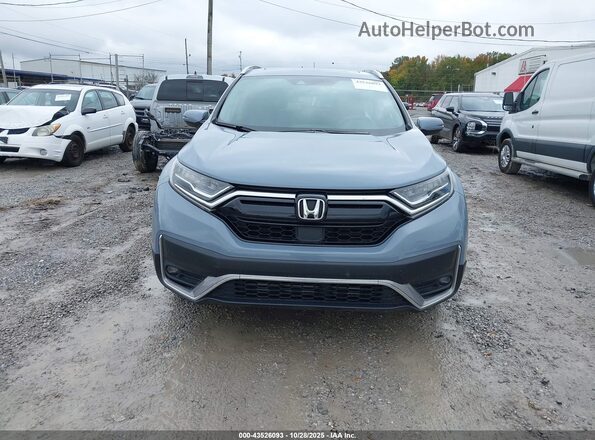 7FARW2H90NE022162 2022 HONDA CR-V Light Blue Vista interior trasera