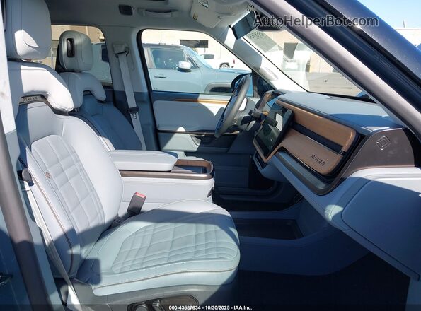 7FCTGCAPXSN042441 2025 RIVIAN R1T Light Blue Widok wnętrza z przodu