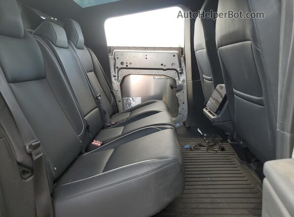 7G2CEHED6RA021355 2024 TESLA CYBERTRUCK Silver Հետևի նստատեղերի տեսք