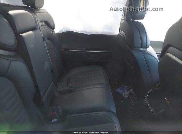 7PDSGBBAXSN063787 2025 RIVIAN R1S Green VIN կոդի պիտակի տեսք