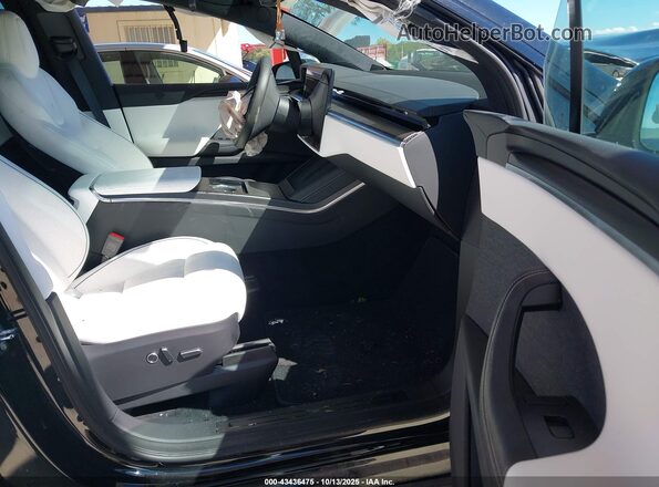 7SAXCBE60SF462340 2025 TESLA MODEL X Black Front interior view