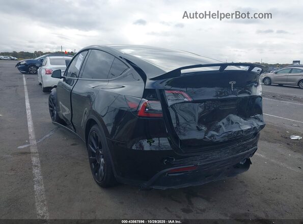 7SAYGAEE0SF285203 2025 TESLA MODEL Y Black Tył lewy