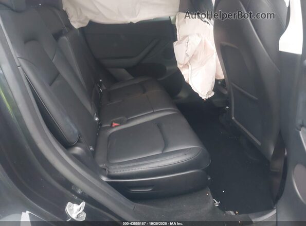 7SAYGAEE5SF263181 2025 TESLA MODEL Y Black Vista de la etiqueta del VIN