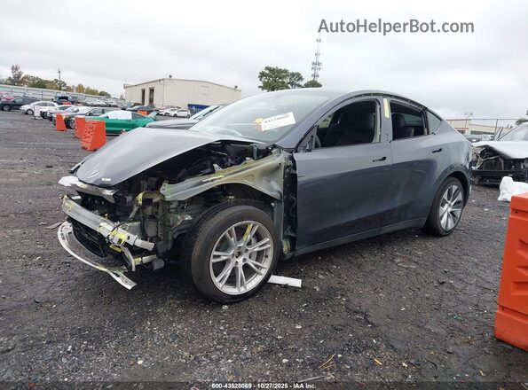 7SAYGAEE6PF600769 2023 TESLA MODEL Y Gray 