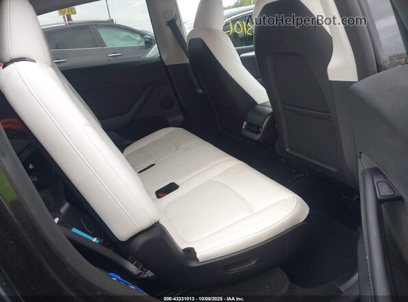 7SAYGAEE7RF076826 2024 TESLA MODEL Y Gray Widok naklejki z numerem VIN