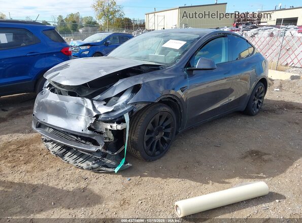 7SAYGAEE8NF316654 2022 TESLA MODEL Y Gray Vista tres cuartos delantera izquierda