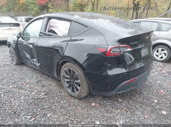 7SAYGAEEXRF060832 2024 TESLA MODEL Y Black Tył lewy