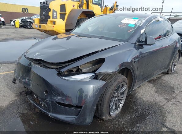 7SAYGDED2RF182142 2024 TESLA MODEL Y Black Front left