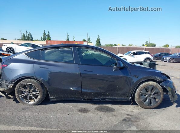 7SAYGDED2RF182142 2024 TESLA MODEL Y Black Rear interior view