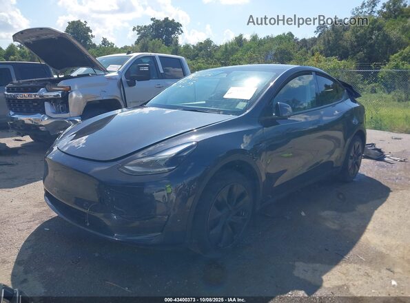7SAYGDED8RF197535 2024 TESLA MODEL Y Gray წინა მარცხენა ხედი სამი მეოთხედიდან