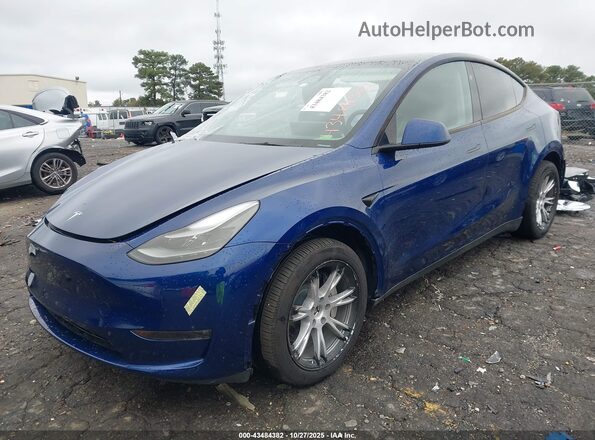 7SAYGDEE1RA269634 2024 TESLA MODEL Y Blue Vista tres cuartos delantera izquierda