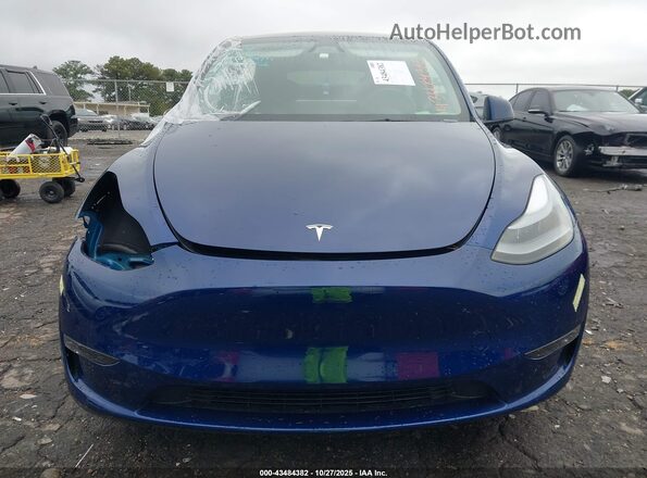 7SAYGDEE1RA269634 2024 TESLA MODEL Y Blue Vista interior trasera