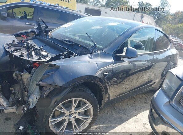 7SAYGDEE3RA283356 2024 TESLA MODEL Y Gray Առջևի ձախ երեք քառորդ տեսարան