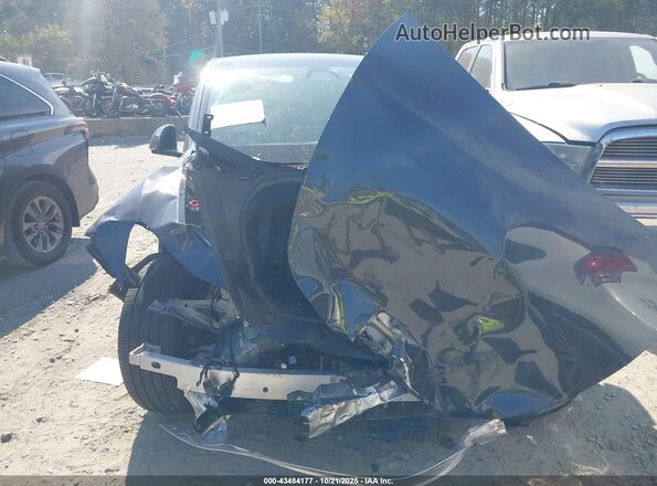 7SAYGDEE3RA283356 2024 TESLA MODEL Y Gray Սալոնի հետևի տեսք