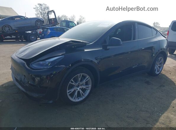 7SAYGDEE3RF063296 2024 TESLA MODEL Y Black Vista tres cuartos delantera izquierda