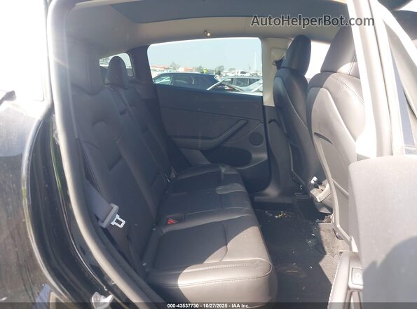 7SAYGDEE3RF063296 2024 TESLA MODEL Y Black Vista interior delantera