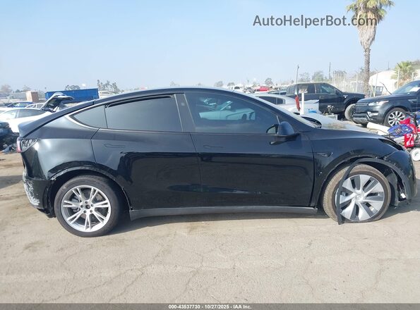 7SAYGDEE3RF063296 2024 TESLA MODEL Y Black Vista interior trasera