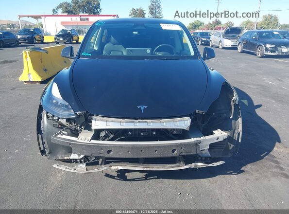 7SAYGDEE3RF983817 2024 TESLA MODEL Y Black Вид задньої частини салону