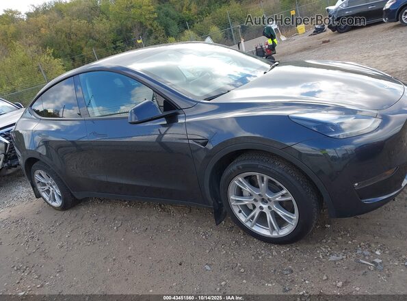 7SAYGDEE5RF031353 2024 TESLA MODEL Y Черный Вид задней части салона